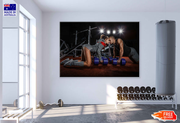 Couple Doing Push Up with Dumbbells on Gym floor  Print 100% Australian Made Stretched Canvas Ready to Hang - 2194